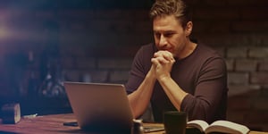 Man looking at laptop